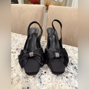 Elegant Black Slingback Heels with Bow Accent